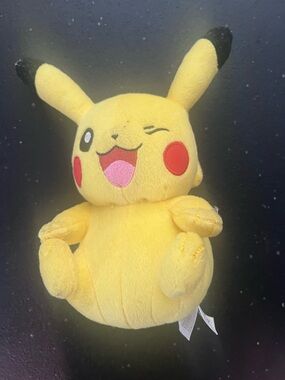 Yellow Pikachu plushie Tomy Pokemon